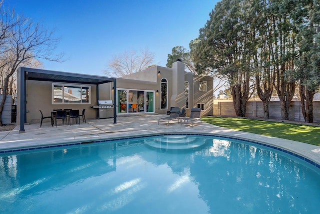 6507 Loftus Ave NE, Albuquerque, NM 87109 - view of swimming pool with a patio and grilling area
