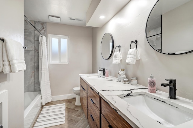 6507 Loftus Ave NE, Albuquerque, NM 87109 - full bath with toilet, baseboards, shower / tub combo with curtain, double vanity, and recessed lighting