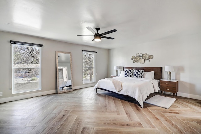 6507 Loftus Ave NE, Albuquerque, NM 87109 - bedroom with multiple windows, baseboards, and ceiling fan