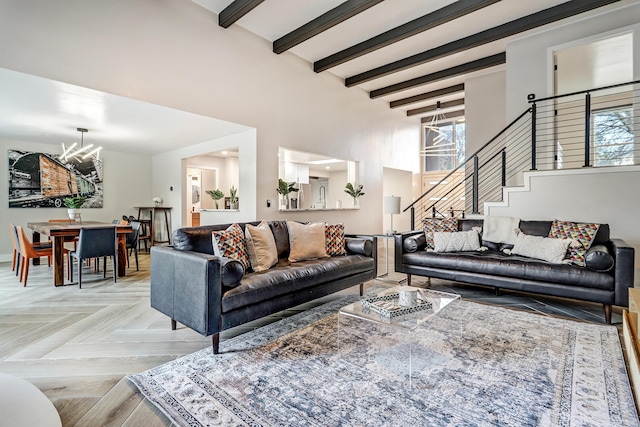6507 Loftus Ave NE, Albuquerque, NM 87109 - living room with a chandelier, a high ceiling, stairway, and beam ceiling