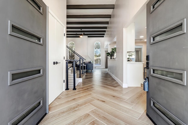 6507 Loftus Ave NE, Albuquerque, NM 87109 - foyer with beam ceiling, stairs, and light wood-style flooring