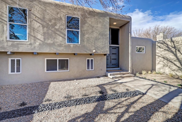 6507 Loftus Ave NE, Albuquerque, NM 87109 - back of property featuring stucco siding