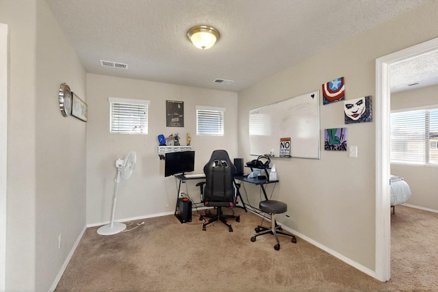 3136 Morrissey St SW, Albuquerque, NM 87121 - carpeted home office with a textured ceiling and baseboards