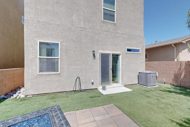 3136 Morrissey St SW, Albuquerque, NM 87121 - back of property with stucco siding and central AC unit