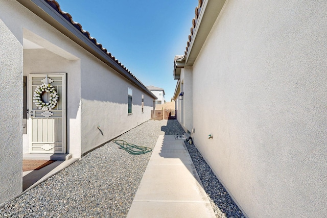 3179 Kunzita St SE, Rio Rancho, NM 87124 - view of home's exterior with stucco siding and a tile roof