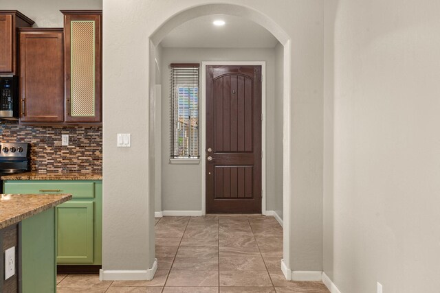 4909 Calle Espana NW, Albuquerque, NM 87120 - foyer with arched walkways and baseboards