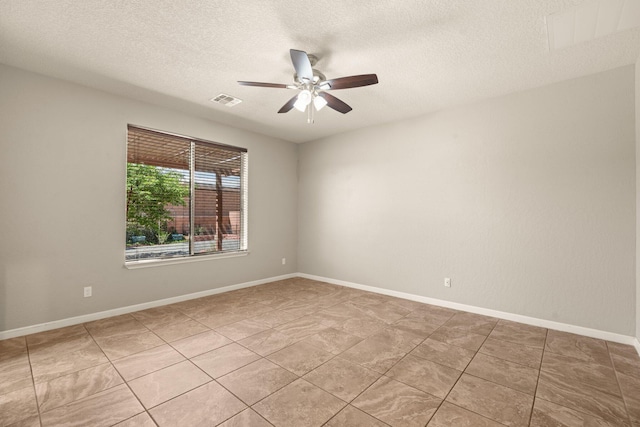 4909 Calle Espana NW, Albuquerque, NM 87120 - spare room featuring a ceiling fan and a textured ceiling