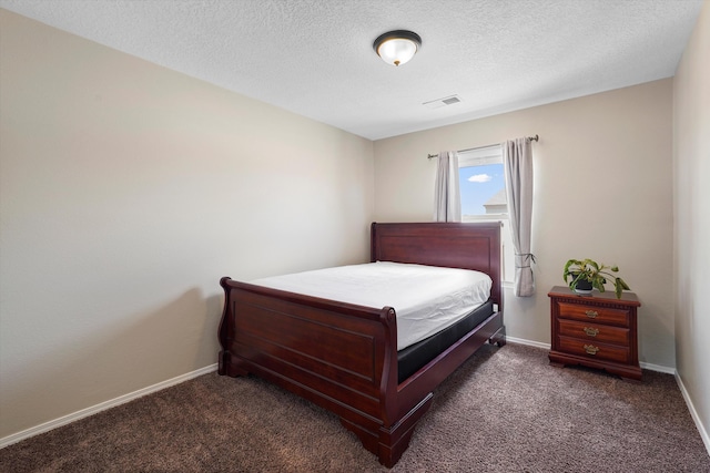 3129 Cochiti St NE, Rio Rancho, NM 87144 - carpeted bedroom with baseboards and a textured ceiling