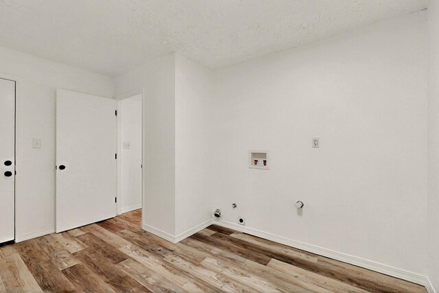 357 Meade Ct, Rio Communities, NM 87002 - laundry room featuring hookup for a gas dryer, wood finished floors, washer hookup, and baseboards