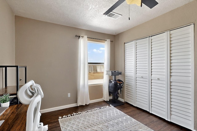 1952 Raspberry Dr NE, Rio Rancho, NM 87144 - office space with a textured ceiling, ceiling fan, wood finished floors, and baseboards
