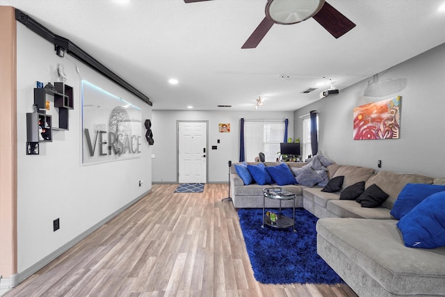 656 Cottontail St SW, Albuquerque, NM 87121 - living area with light wood finished floors, a ceiling fan, recessed lighting, and baseboards