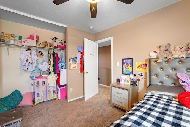 656 Cottontail St SW, Albuquerque, NM 87121 - carpeted bedroom with a closet, a ceiling fan, baseboards, and a textured ceiling