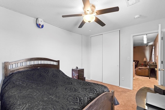 656 Cottontail St SW, Albuquerque, NM 87121 - bedroom with carpet flooring, a closet, and ceiling fan