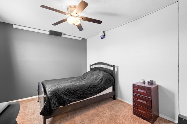 656 Cottontail St SW, Albuquerque, NM 87121 - bedroom with carpet floors, a ceiling fan, and baseboards