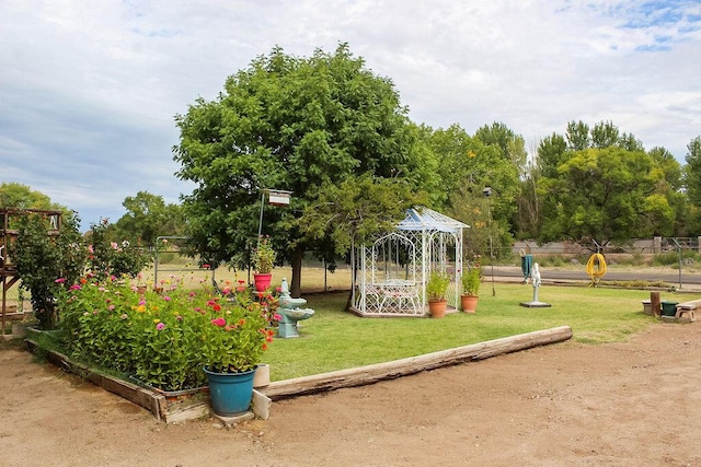 2701 Chapulin Rd SW, Albuquerque, NM 87105 - view of home's community with a lawn