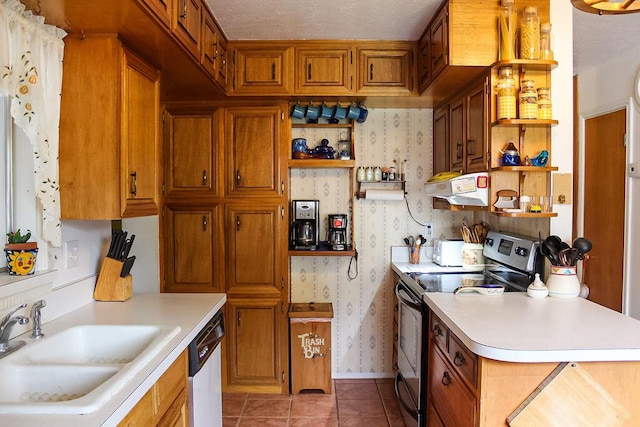 2701 Chapulin Rd SW, Albuquerque, NM 87105 - kitchen with open shelves, stainless steel electric stove, wallpapered walls, dishwasher, and light countertops