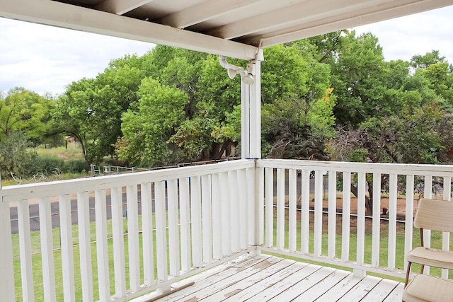 2701 Chapulin Rd SW, Albuquerque, NM 87105 - wooden deck with view of scattered trees