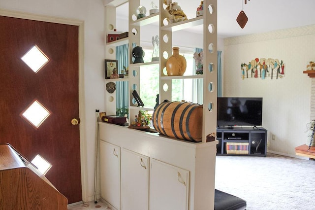 2701 Chapulin Rd SW, Albuquerque, NM 87105 - entryway with light carpet and baseboards