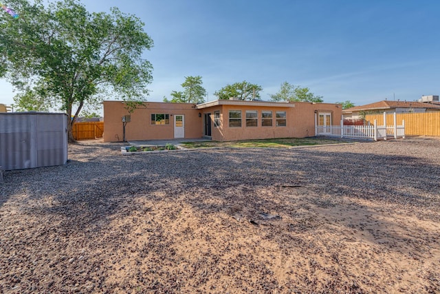 508 Las Marias Dr SE, Rio Rancho, NM 87124 - rear view of house featuring stucco siding
