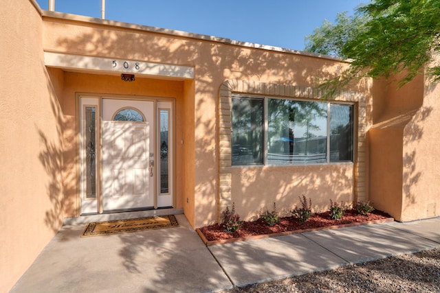 508 Las Marias Dr SE, Rio Rancho, NM 87124 - entrance to property with stucco siding