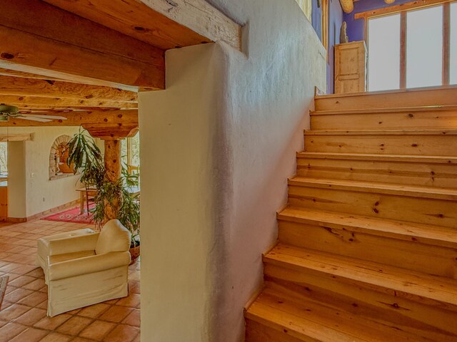 33 Kestrel Rd, Ramah, NM 87321 - stairs featuring ceiling fan and tile patterned floors