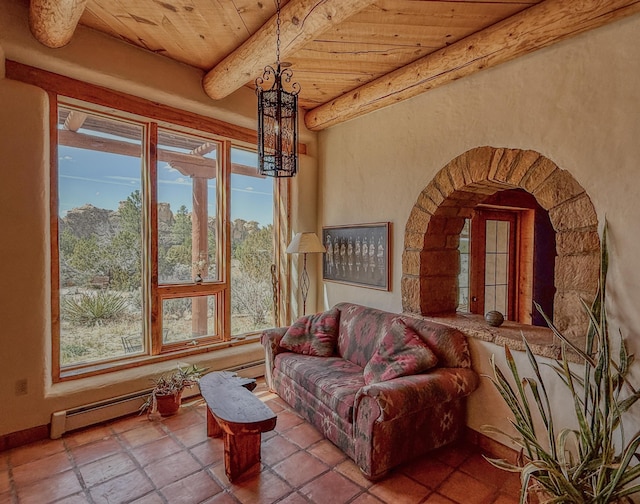 33 Kestrel Rd, Ramah, NM 87321 - living room with wooden ceiling, beam ceiling, and a chandelier