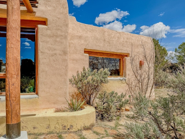 33 Kestrel Rd, Ramah, NM 87321 - view of home's exterior with stucco siding