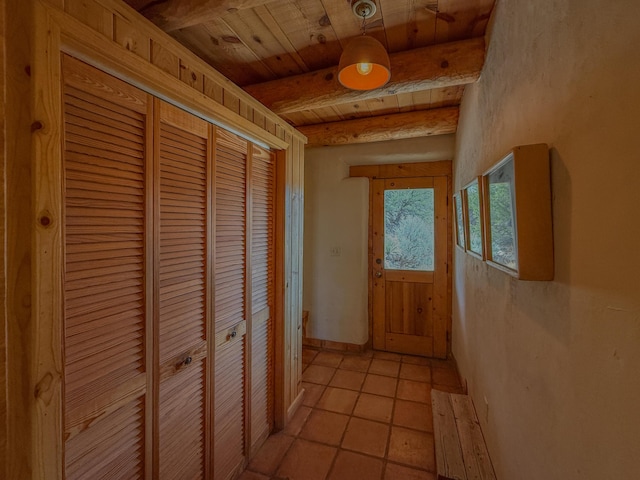 33 Kestrel Rd, Ramah, NM 87321 - corridor with wooden ceiling, beam ceiling, and light tile patterned flooring