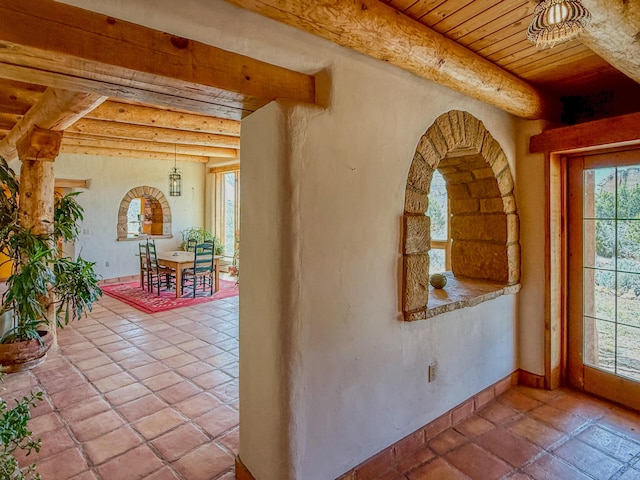 33 Kestrel Rd, Ramah, NM 87321 - interior space with beam ceiling, wooden ceiling, and baseboards