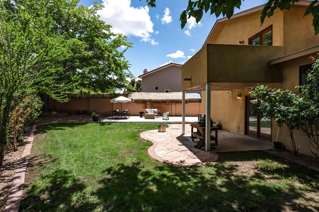 7416 Don Tomas Ln NE, Albuquerque, NM 87109 - view of yard with a patio area