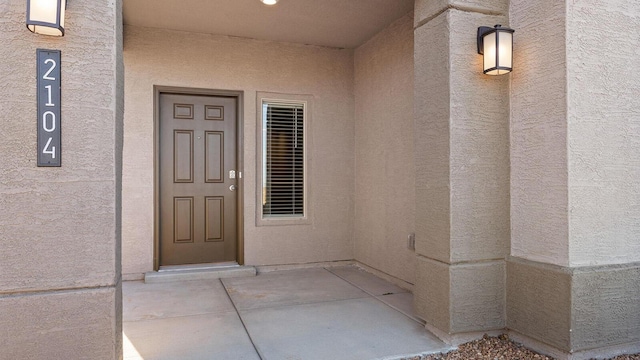 5523 Sagan Loop SE, Albuquerque, NM 87106 - view of exterior entry with stucco siding