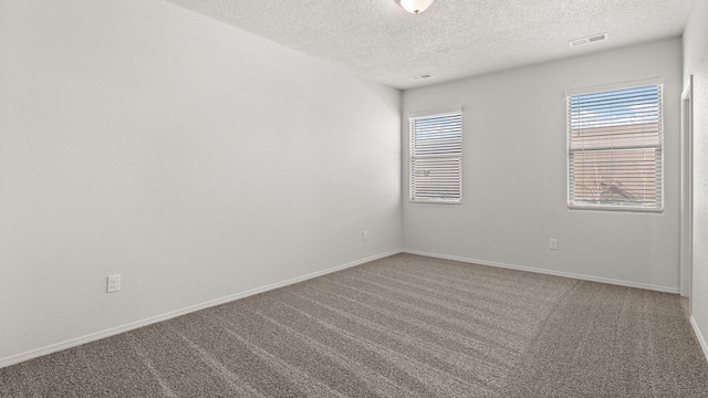 5523 Sagan Loop SE, Albuquerque, NM 87106 - unfurnished room with a textured ceiling, carpet, and baseboards