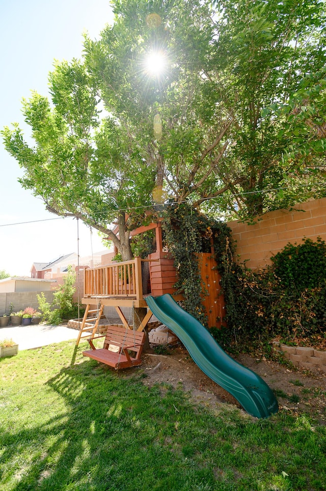 9301 Holm Bursun Dr NW, Albuquerque, NM 87114 - view of jungle gym featuring a fenced backyard