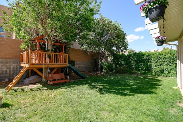 9301 Holm Bursun Dr NW, Albuquerque, NM 87114 - fenced backyard with a playground
