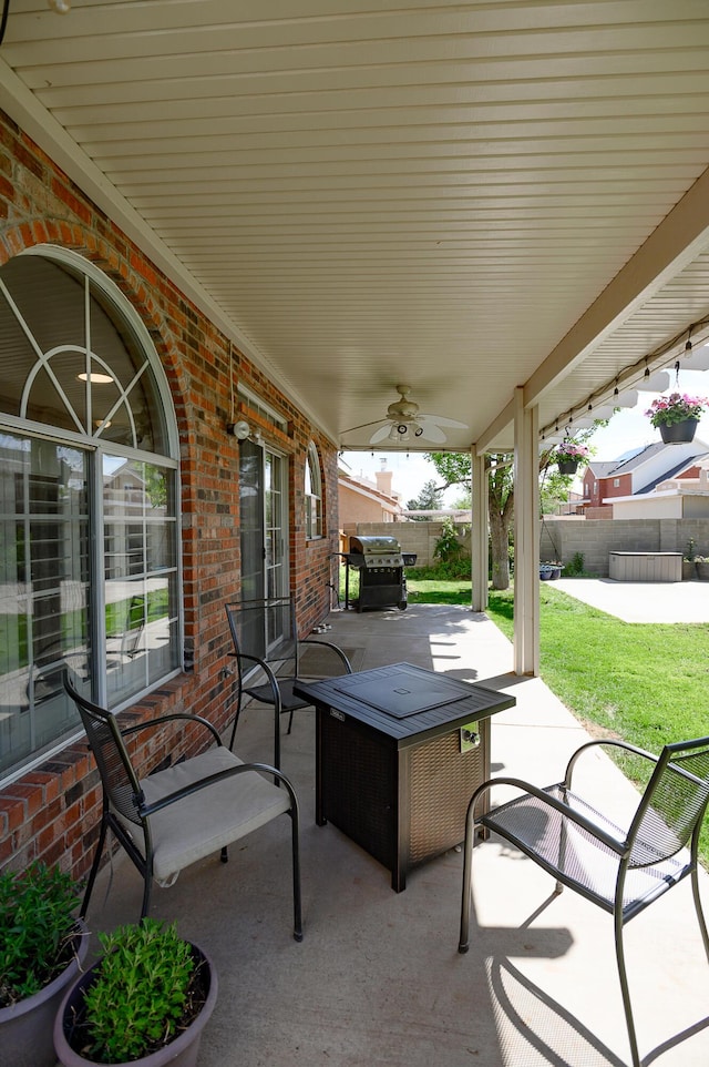9301 Holm Bursun Dr NW, Albuquerque, NM 87114 - view of patio / terrace featuring ceiling fan and a grill