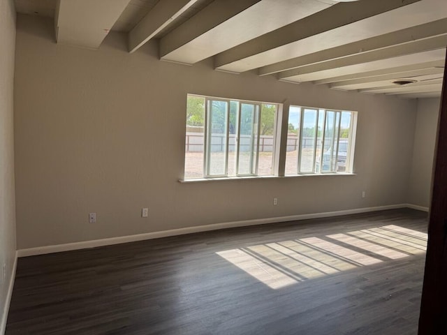 2327 Pajarito Rd SW, Albuquerque, NM 87105 - unfurnished room featuring beam ceiling, baseboards, and dark wood-style floors