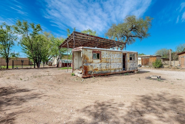 2327 Pajarito Rd SW, Albuquerque, NM 87105 - view of outbuilding with fence and an outbuilding