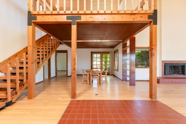 3121 Grande Vista Pl NW, Albuquerque, NM 87120 - unfurnished dining area with wood finished floors and a tile fireplace