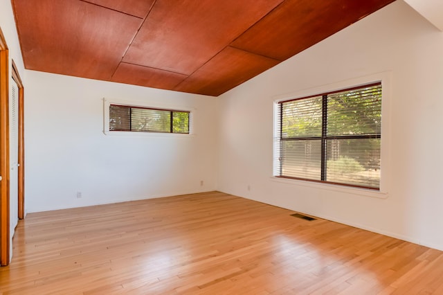 3121 Grande Vista Pl NW, Albuquerque, NM 87120 - empty room featuring vaulted ceiling, healthy amount of natural light, light wood-style floors, and wooden ceiling