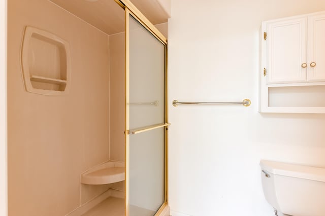 3121 Grande Vista Pl NW, Albuquerque, NM 87120 - full bath with a shower stall and toilet
