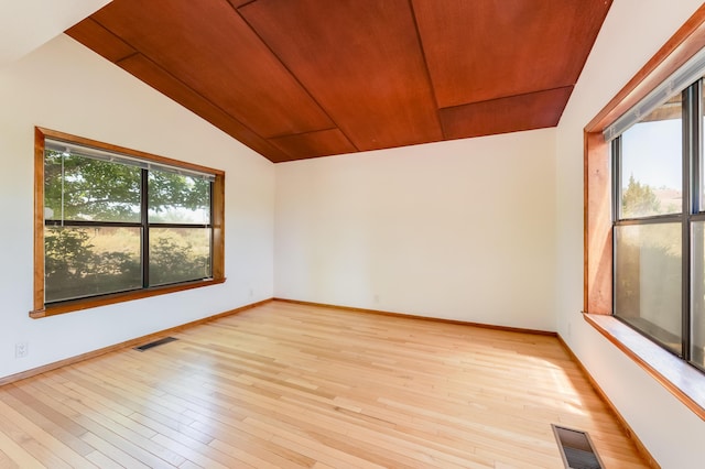 3121 Grande Vista Pl NW, Albuquerque, NM 87120 - unfurnished room featuring vaulted ceiling, light wood-style floors, wooden ceiling, and baseboards