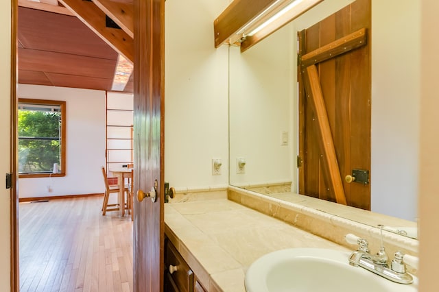 3121 Grande Vista Pl NW, Albuquerque, NM 87120 - bathroom featuring wood finished floors and vanity