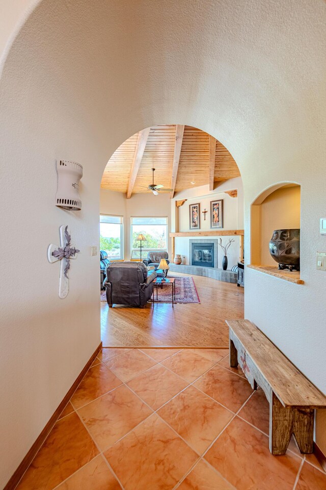 2392 Manzano Loop NE, Rio Rancho, NM 87144 - hallway featuring wooden ceiling, tile patterned floors, and arched walkways