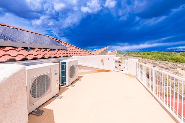 2392 Manzano Loop NE, Rio Rancho, NM 87144 - view of patio / terrace featuring a gate and a cooling unit