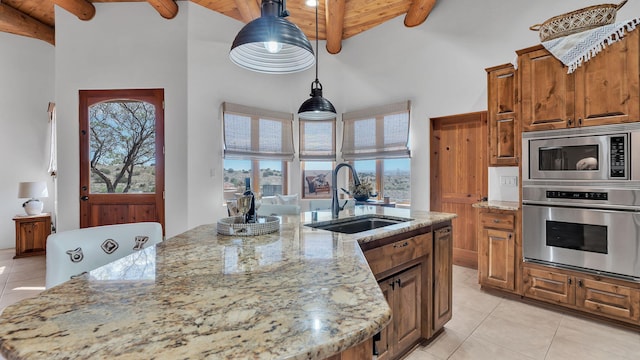 59 Sky Mountain Rd, Placitas, NM 87043 - kitchen with stainless steel appliances, a sink, wood ceiling, light tile patterned flooring, and a high ceiling