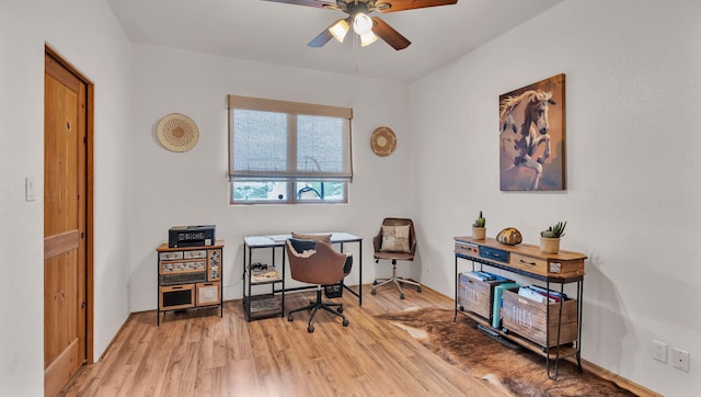 59 Sky Mountain Rd, Placitas, NM 87043 - home office with ceiling fan, light wood-type flooring, and baseboards