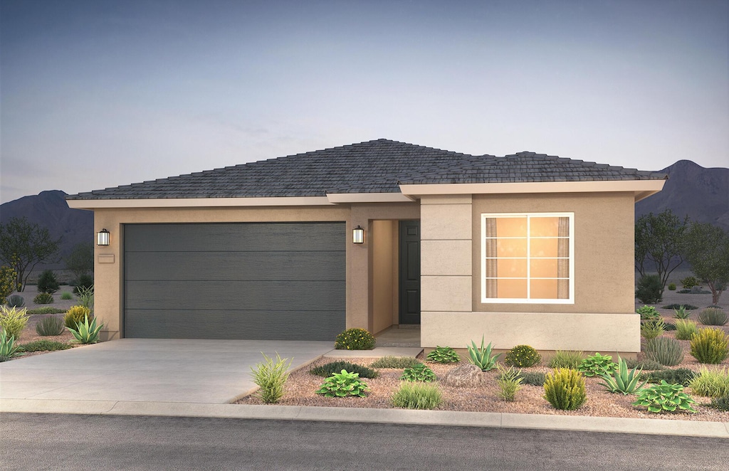 3103 Rene Rd NE, Rio Rancho, NM 87144 - view of front of property with an attached garage, concrete driveway, and stucco siding