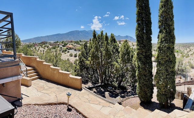 52 Tejon Canon Rd, Placitas, NM 87043 - view of patio featuring stairs and a mountain view