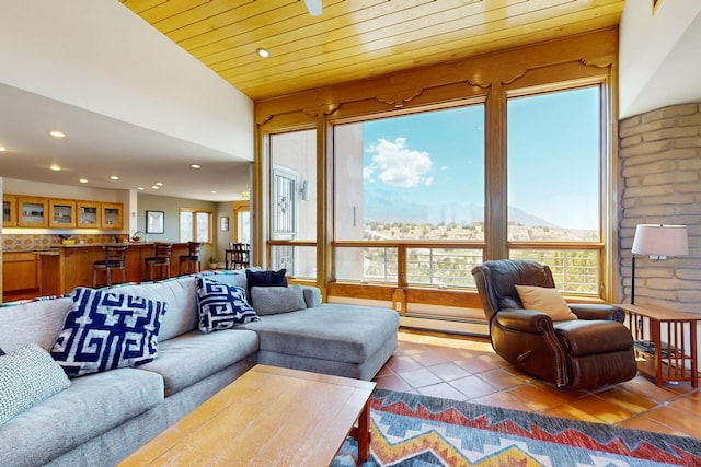 52 Tejon Canon Rd, Placitas, NM 87043 - living area with recessed lighting, tile patterned floors, baseboard heating, and wood ceiling
