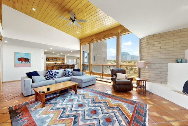 52 Tejon Canon Rd, Placitas, NM 87043 - tiled living room featuring a ceiling fan, recessed lighting, vaulted ceiling, wood ceiling, and a baseboard radiator